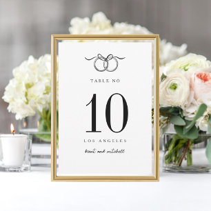Two Rings tied with bow hand drawn table number