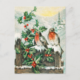 Two robins on a fence in the snow postcard