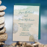 Two Sand Dollars Wedding Ceremony Invitation<br><div class="desc">Beach wedding invitations with sand dollars design. Beach sand and tropical blue-green water is the background for text. Full names of the couple, in modern handwritten script at the top of paper with a paragraph of printed text beneath. Enough text space is provided for a reception address and / or...</div>