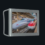 Two Shinkansen at the Tokyo Station Belt Buckle<br><div class="desc">The shinkansen high-speed trains, also known as bullet trains, are the fastest way to discover all of Japan, reaching a speed of 320 km/h (199 mph). The Shinkansen run on separate tracks and platforms since their track gauge is completely different from the others. This is due to the line’s high-speed...</div>