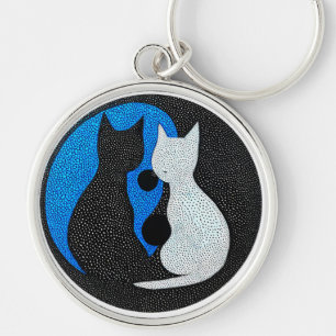 Two stylised cats key ring