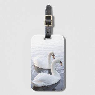 Two Swans Swimming on Tranquil Lake Luggage Tag