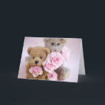 two teddy bears holding roses greeting card<br><div class="desc">well-loved generic stuffed animals with fresh miniature pink roses</div>