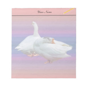 two white geese in colour background notepad