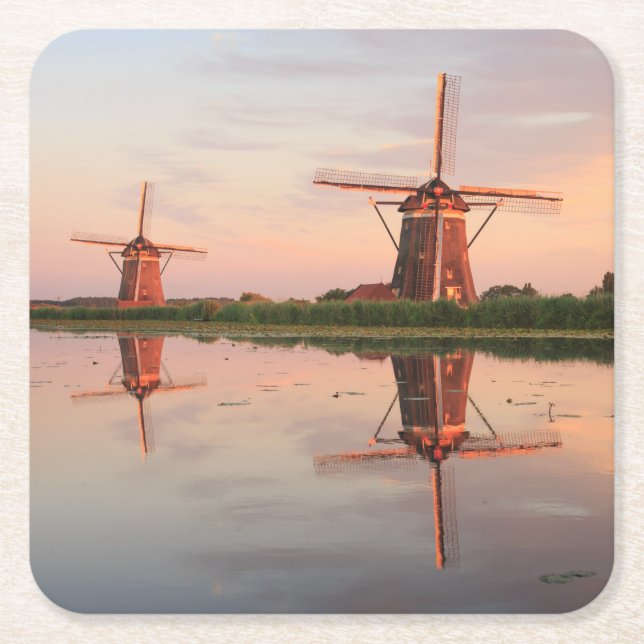 Two windmills with reflection at sunset square paper coaster (Front)