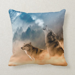 Two wolves howl at the full moon in forest cushion