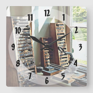 Typecases by Window of Print Shop Square Wall Clock