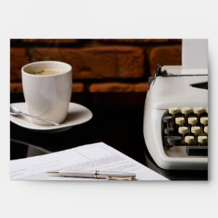 Typewriter and a cup of coffee envelope