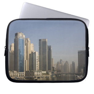 UAE, Dubai. Marina towers with boats at anchor. Laptop Sleeve