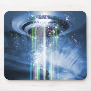 UFO hovering above Earth while abducting humans. Mouse Mat