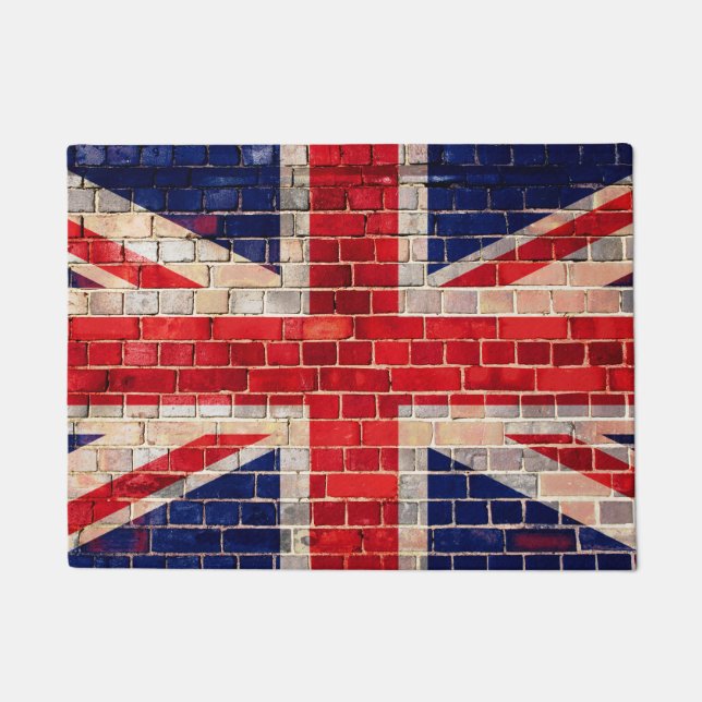 UK flag on a brick wall Doormat (Front)