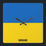 Ukraine Flag Dazzling Patriotic Square Wall Clock<br><div class="desc">Ukraine Flag Dazzling Patriotic Square Wall Clock in the colours and the elements of the Ukraine national flag covering the front of the clock. National flag colours are complemented with the text "Ukraine" on the bottom. Text is fully customisable using "Customise it!" feature. Feel free to change it, remove it...</div>