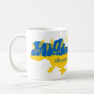 Ukraine typography and wheat ear on Ukrainian flag Coffee Mug