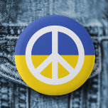 Ukrainian flag peace symbol Ukraine anti war 6 Cm Round Badge<br><div class="desc">Ukraine anti war button featuring a white peace symbol on a blue and yellow ukranian flag background.</div>
