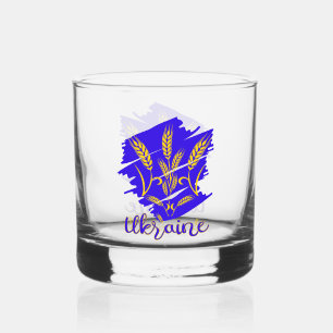 Ukrainian national symbol tryzub made of wheat ear whiskey glass