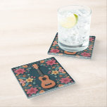 Ukulele Tropical Flowers Musical Instrument Pretty Glass Coaster<br><div class="desc">Add a musical touch to your decor with this decorative ukulele themed coaster. The stylish drinks coaster pictures a ukulele surrounded by flowers and leaves. The musical instrument and pretty floral display create a harmonious and nature-inspired look. An ideal gift for ukulele enthusiasts and fellow music lovers.</div>