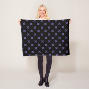 Ultra violet cross stitches on black fleece blanket