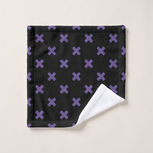 Ultra violet cross stitches on black wash cloth