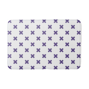 Ultra violet cross stitches on white bath mat