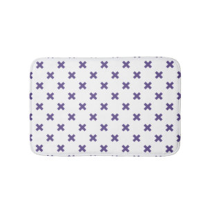 Ultra violet cross stitches on white bath mat