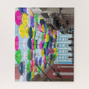 Umbrellas Above San Juan Streets and Mansion Jigsaw Puzzle
