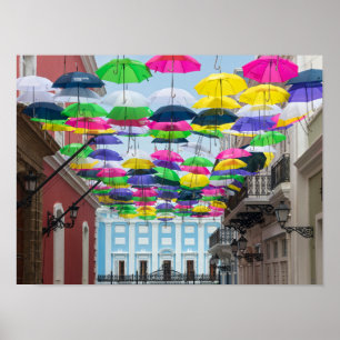 Umbrellas Above San Juan Streets and Mansion Poster