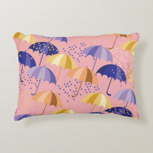 Umbrellas, drops, colourful seamless motif. decorative cushion
