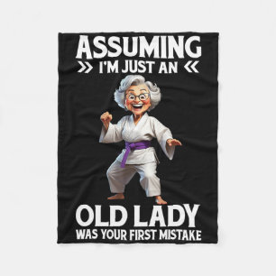 Uming I'm Just An Old Lady Was Your First Mistake Fleece Blanket
