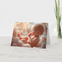 Unborn Baby In Pink Clouds