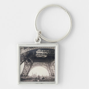 Under the Eiffel Tower, before ascending, from 'L' Key Ring