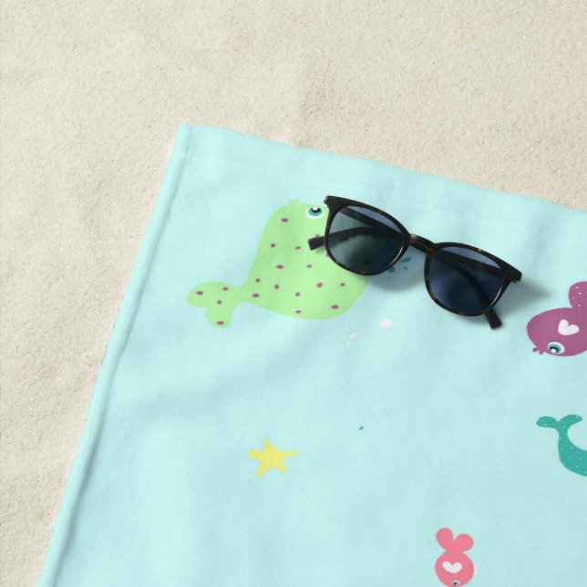 Under water creatures pattern blue beach towel (In Situ)