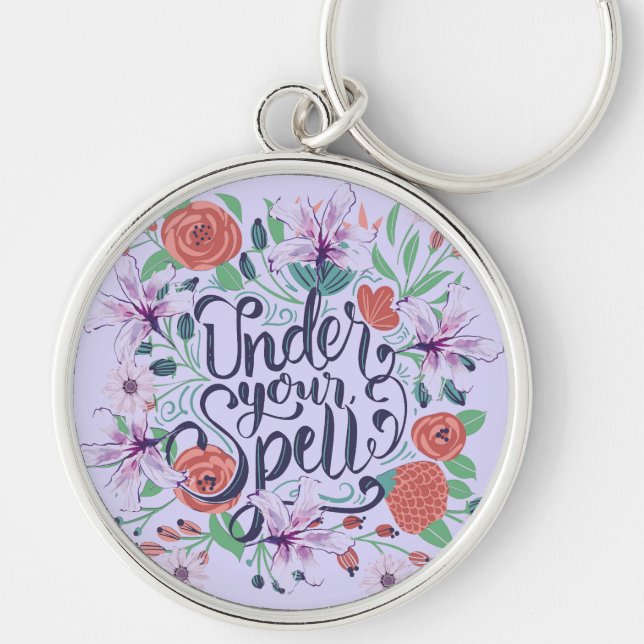 UNDER YOUR SPELL KEY RING (Front)