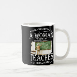 Underestimate woman who teaches in her seventies coffee mug