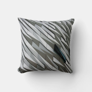 Undulating abstract shapes on a building facade at cushion