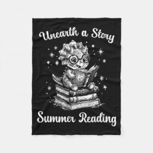 Unearth a story triceratops dinosaur reading books fleece blanket