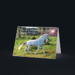 Unicorn, Birthday for Granddaughter, Magical Dream Card<br><div class="desc">Happy Birthday for a special granddaughter. Greeting card features a unicorn with light coming from the tip of the horn. Magical image with white unicorn prancing through the grass with trees in the background. Original horse photo element courtesy of the USDA/SBauer (Public Domain). Copyright © Shoaff-Ballanger Studios.</div>