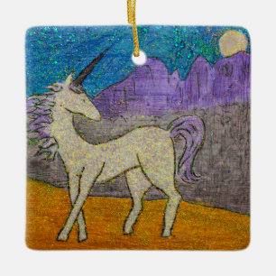 Unicorn looking back at the mountain ridgeline ceramic ornament