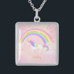 Unicorn necklace with magical pink gold glitter<br><div class="desc">Unicorn necklace with magical pink,  gold glitter and rainbow colours! Text in gold with a rainbow unicorn against a soft pastel pink background.  Perfect gift for the unicorn lover in your life.   Change the background colour if you like!</div>