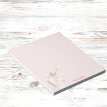 Unicorn pink name girl notepad<br><div class="desc">A cute pink and golden unicorn head.  A soft,  blush pink background. Personalise and add your name.  Pink letters.</div>
