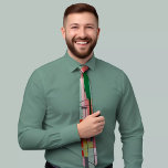 Unique geometric tie<br><div class="desc">Stand out from the crowd with our latest fashion tie collection! This eye-catching geometric design features vibrant shapes like squares, triangles, and rectangles in bold colours like pink, green, orange, and yellow. Perfect for formal events, this tie adds a pop of colour to any outfit while maintaining its elegance. Make...</div>
