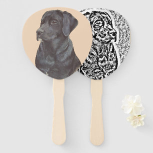 unique portrait of cute black labrador dog hand fan