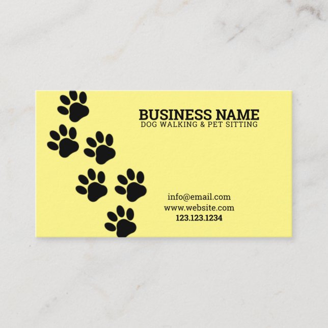 Unique Yellow & Black Paw Print Steps Dog Walker Business Card (Front)