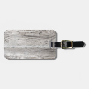 Untreated wood structure as background texture luggage tag