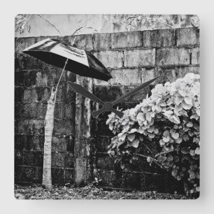 up against the rain square wall clock