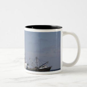 US Coast Guard Cutter Marlin patrols the waters Two-Tone Coffee Mug