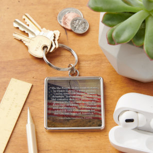 US Constitution Preamble Over Rustic Background Key Ring