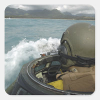 US Marine driving an amphibious assault vehicle