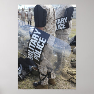 US Marines and Sailors don riot gear Poster