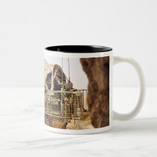 US Soldiers conduct a combat patrol in Afghanis Two-Tone Coffee Mug