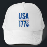 USA 1776 TRUCKER HAT<br><div class="desc">USA and 1776 in a unique font is printed on this unisex trucker hat highlighted with red and blue stripes and a gold star. MATCHING items in our store.</div>